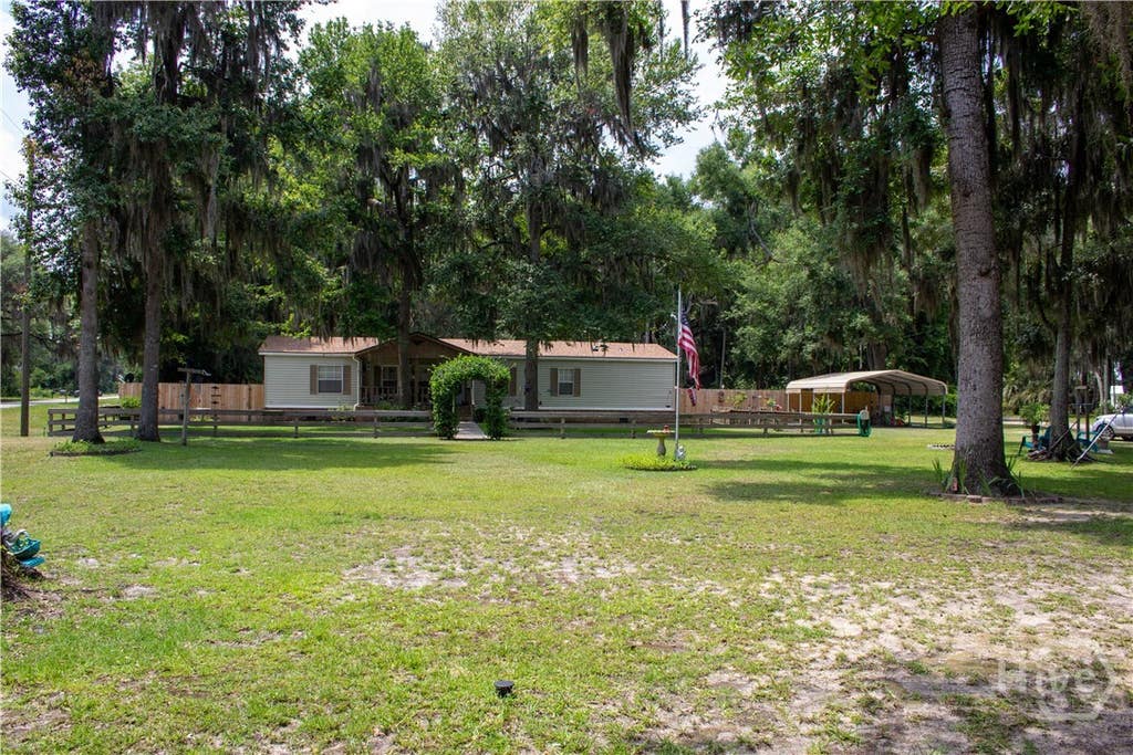 Photo of 364 Lake Pamona Road, Midway, GA 31320 (MLS # SA361653)