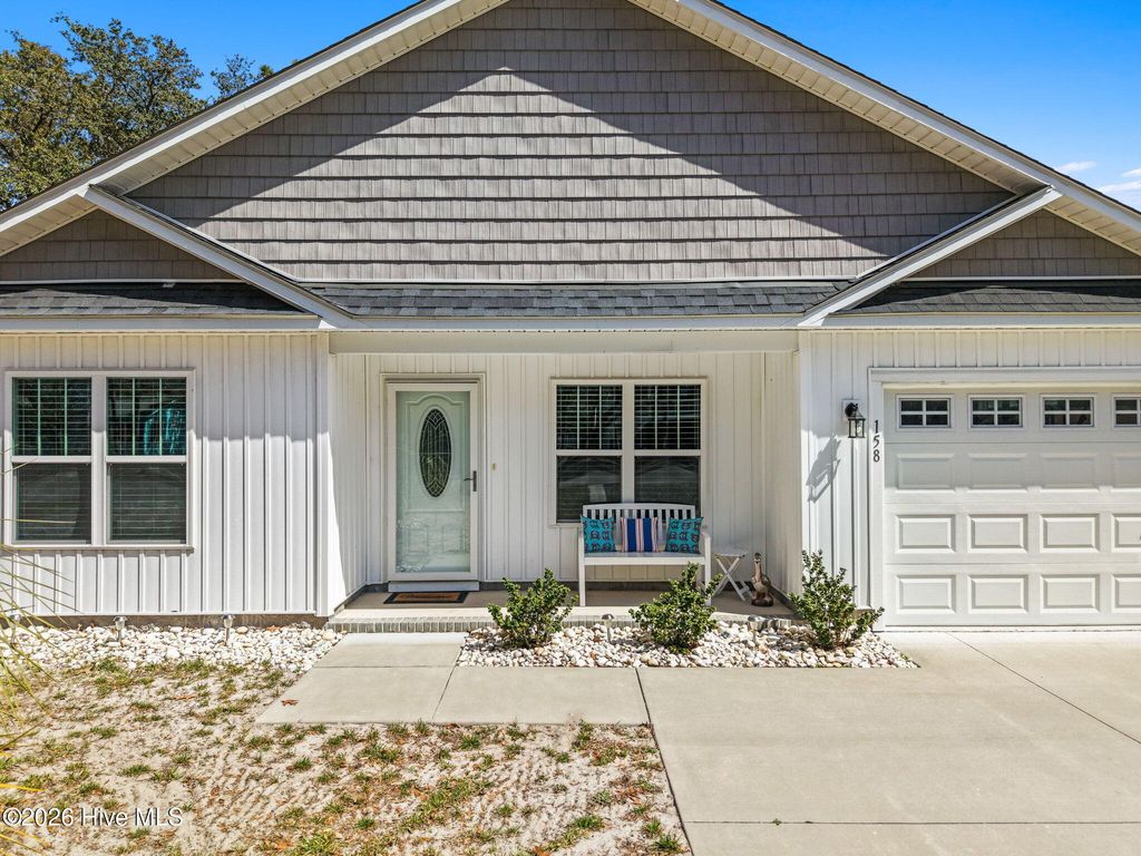 Photo of 158 NW 1st Street, Oak Island, NC 28465 (MLS # 100564601)