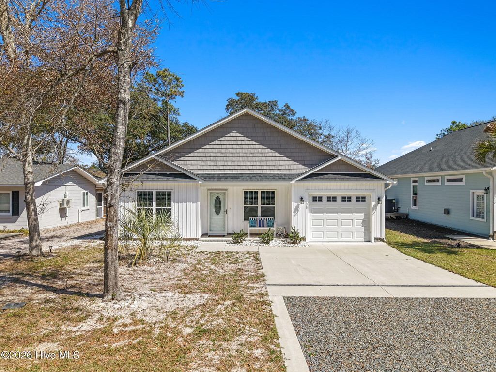 Photo of 158 NW 1st Street, Oak Island, NC 28465 (MLS # 100564601)