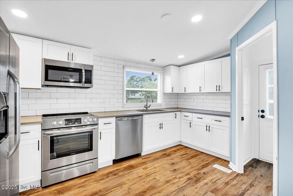 Photo of 6617 Sago Palm Drive, Wilmington, NC 28412 (MLS # 100507376)