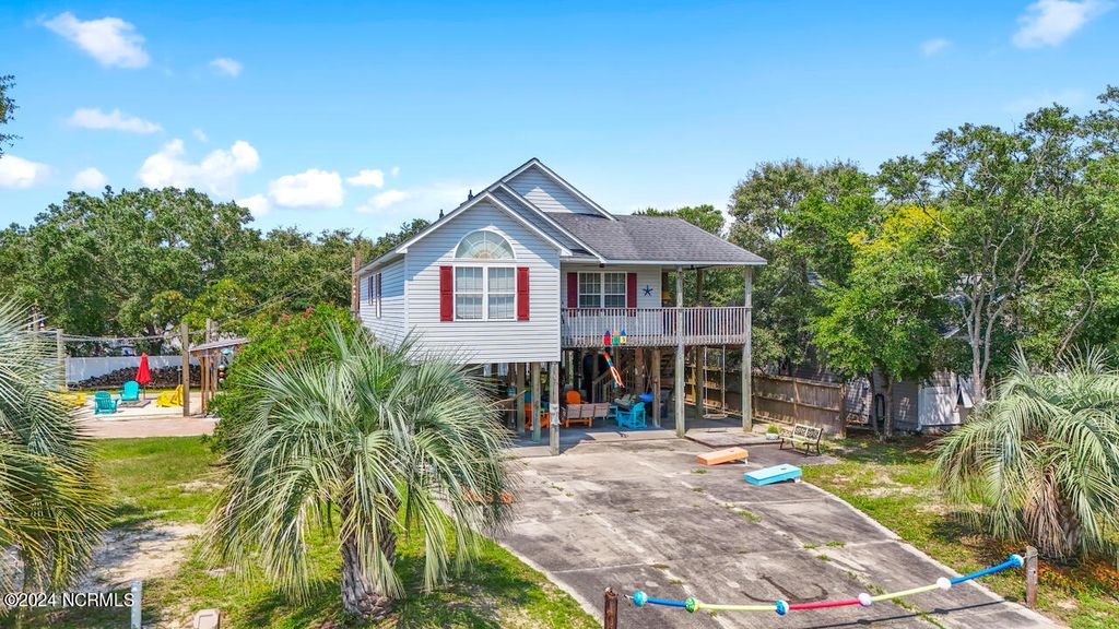 Photo of 303 NE 50th Street, Oak Island, NC 28465 (MLS # 100461255)