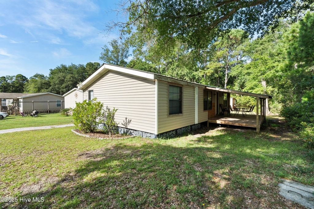 Photo of 1586 W Kilbart Drive SW, Ocean Isle Beach, NC 28469 (MLS # 100519886)