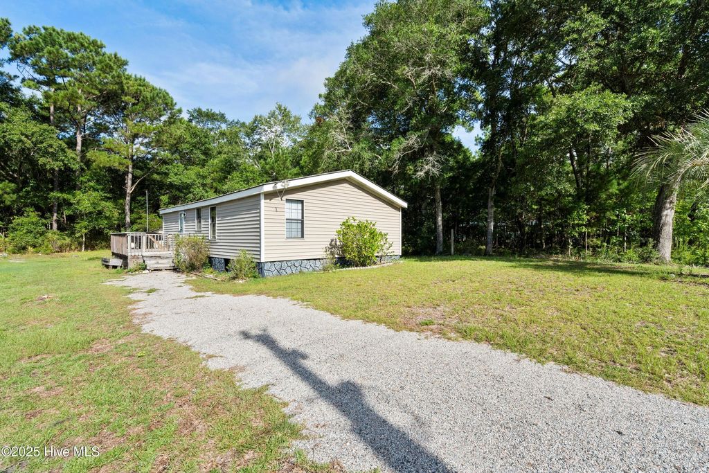 Photo of 1586 W Kilbart Drive SW, Ocean Isle Beach, NC 28469 (MLS # 100519886)
