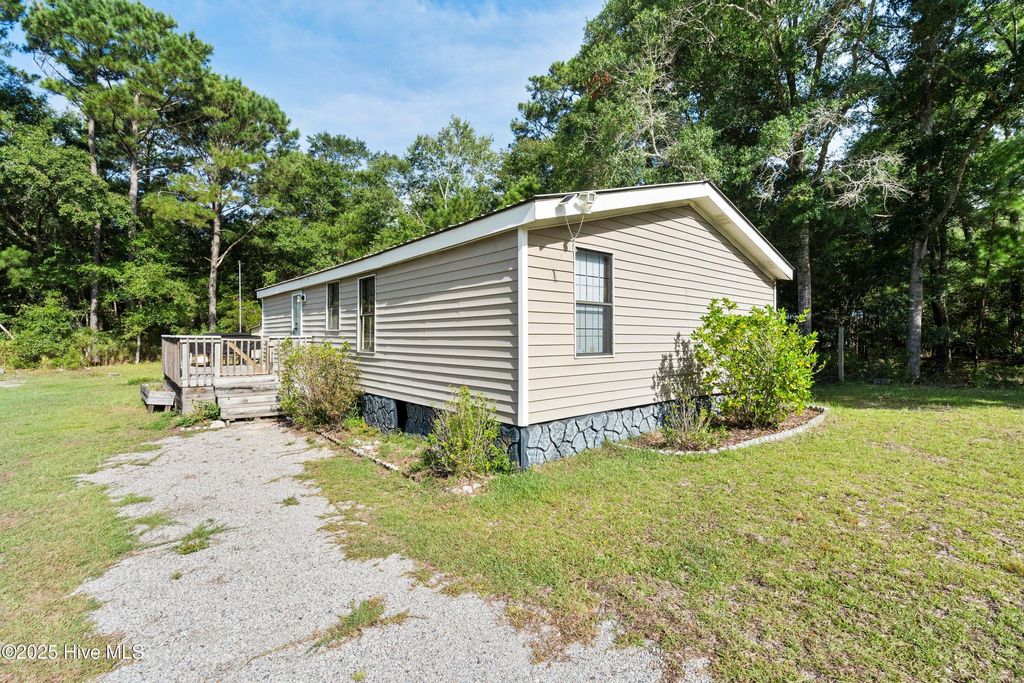 Photo of 1586 W Kilbart Drive SW, Ocean Isle Beach, NC 28469 (MLS # 100519886)