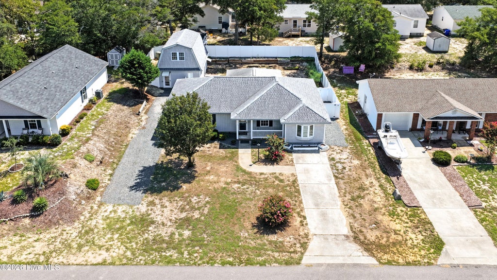 Photo of 114 NE 8th St ST, Oak Island, NC 28465 (MLS # 100601553)
