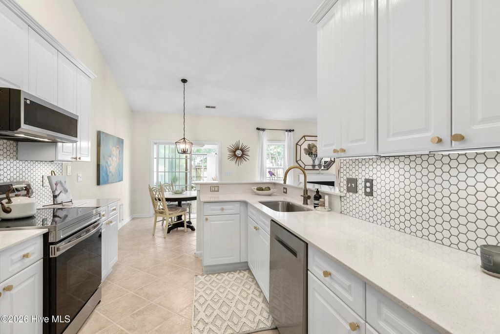 Photo of 1007 Maplechase Drive SE, Leland, NC 28451 (MLS # 100574560)