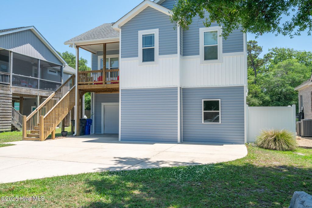 Photo of 106 NW 8th Street, Oak Island, NC 28465 (MLS # 100527640)