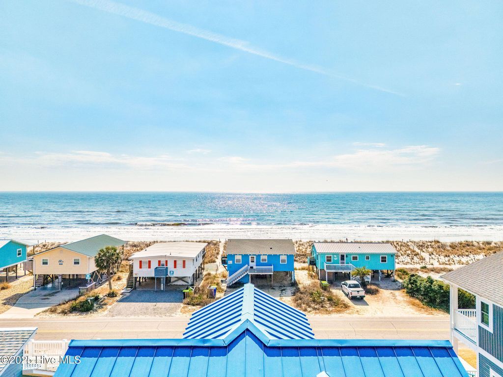 Photo of 318 E Beach Drive, Oak Island, NC 28465 (MLS # 100529088)