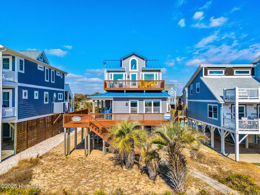 Photo of 318 E Beach Drive, Oak Island, NC 28465 (MLS # 100529088)