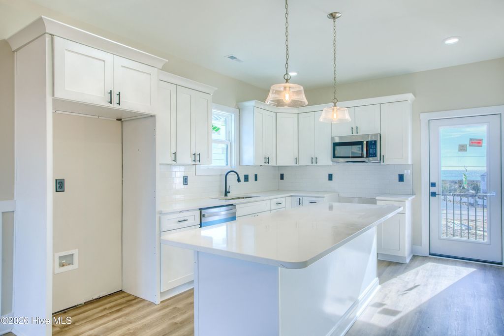 Photo of 717 N New River Drive #B, Surf City, NC 28445 (MLS # 100552257)