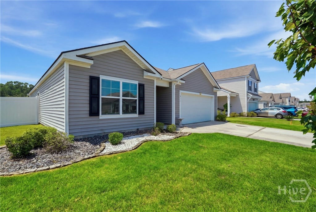 Photo of 211 Caribbean Village Drive Dr, Guyton, GA 31312 (MLS # SA363036)