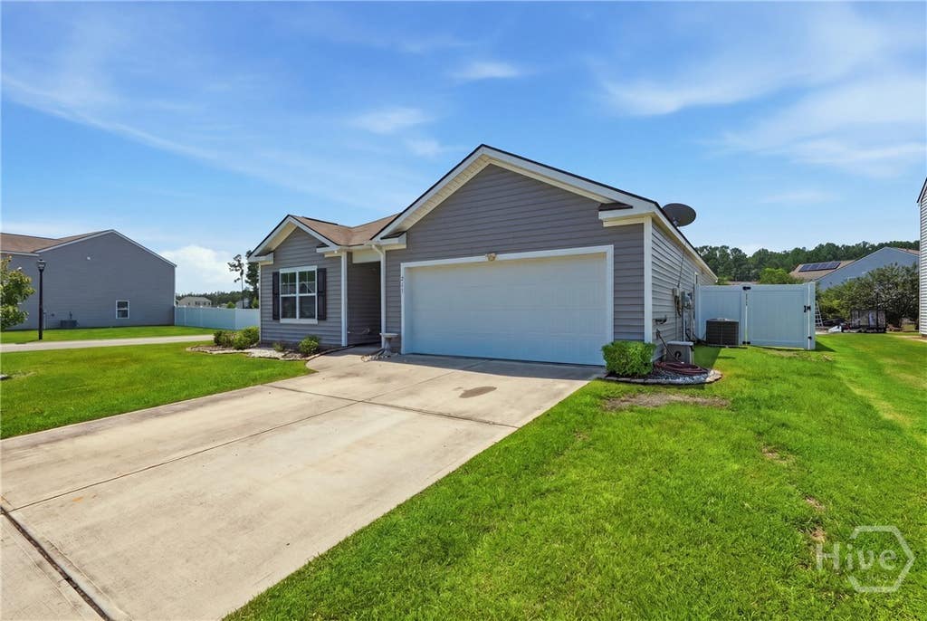 Photo of 211 Caribbean Village Drive Dr, Guyton, GA 31312 (MLS # SA363036)