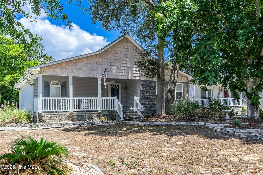 Photo of 302 E Oak Island Drive, Oak Island, NC 28465 (MLS # 100583073)