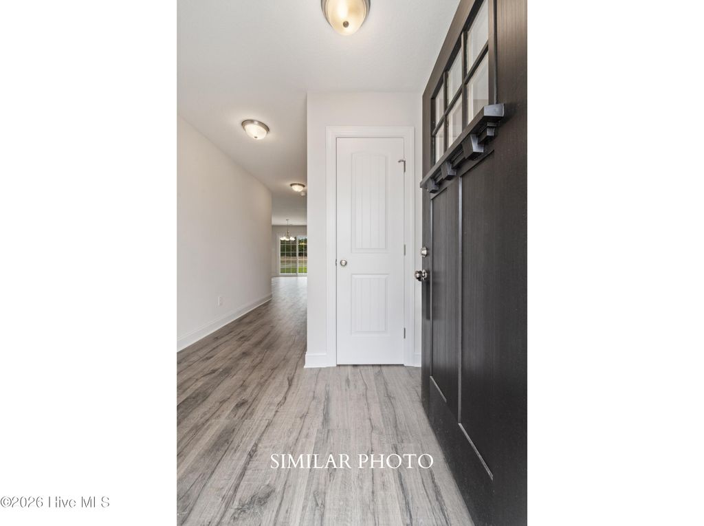 Photo of 115 Twisted Vine Boulevard, Jacksonville, NC 28546 (MLS # 100589047)