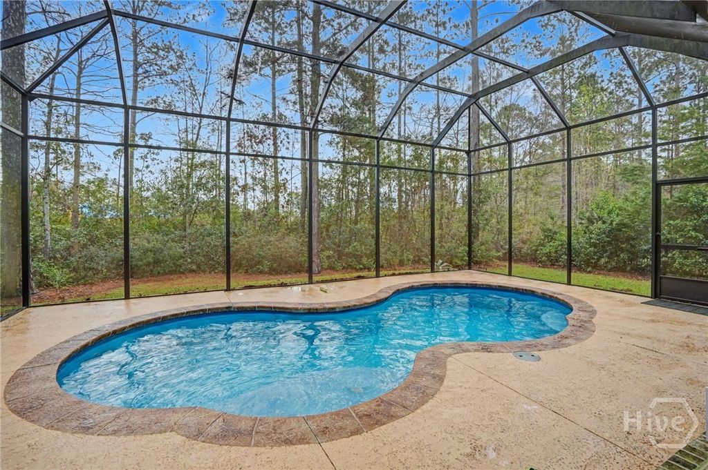 Photo of 230 Ridgewood Park Drive N, Richmond Hill, GA 31324 (MLS # SA350880)