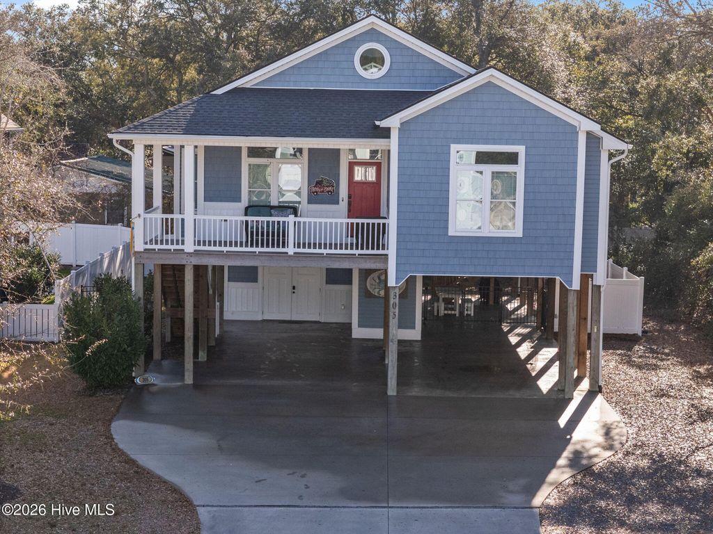 Photo of 305 E Yacht Drive, Oak Island, NC 28465 (MLS # 100548443)