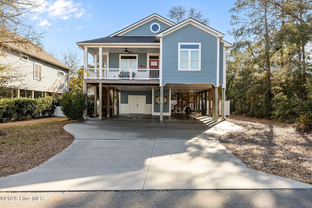 Photo of 305 E Yacht Drive, Oak Island, NC 28465 (MLS # 100548443)