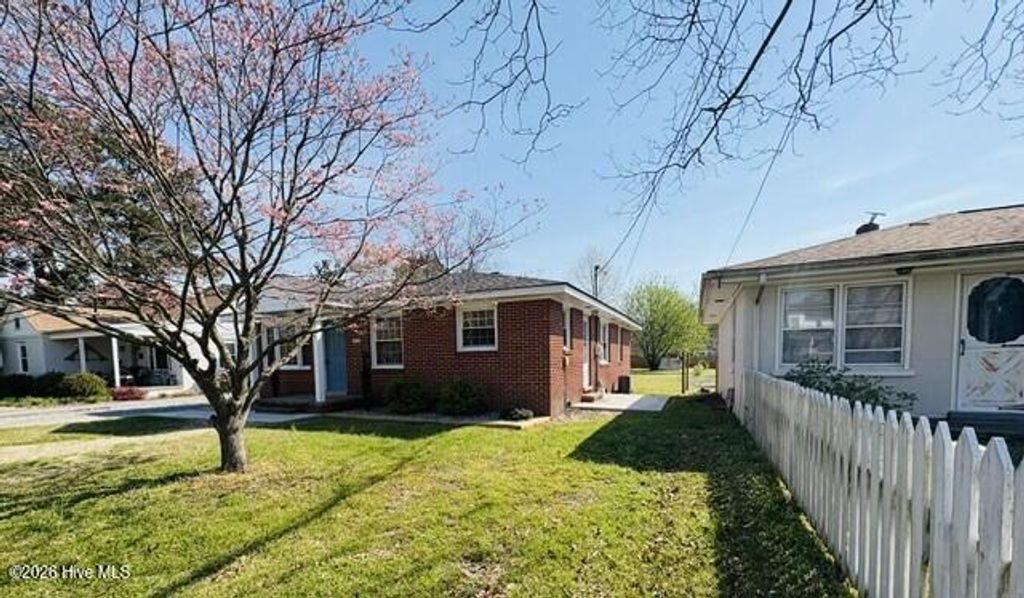 Photo of 302 NE Railroad Street, Pikeville, NC 27863 (MLS # 100563535)