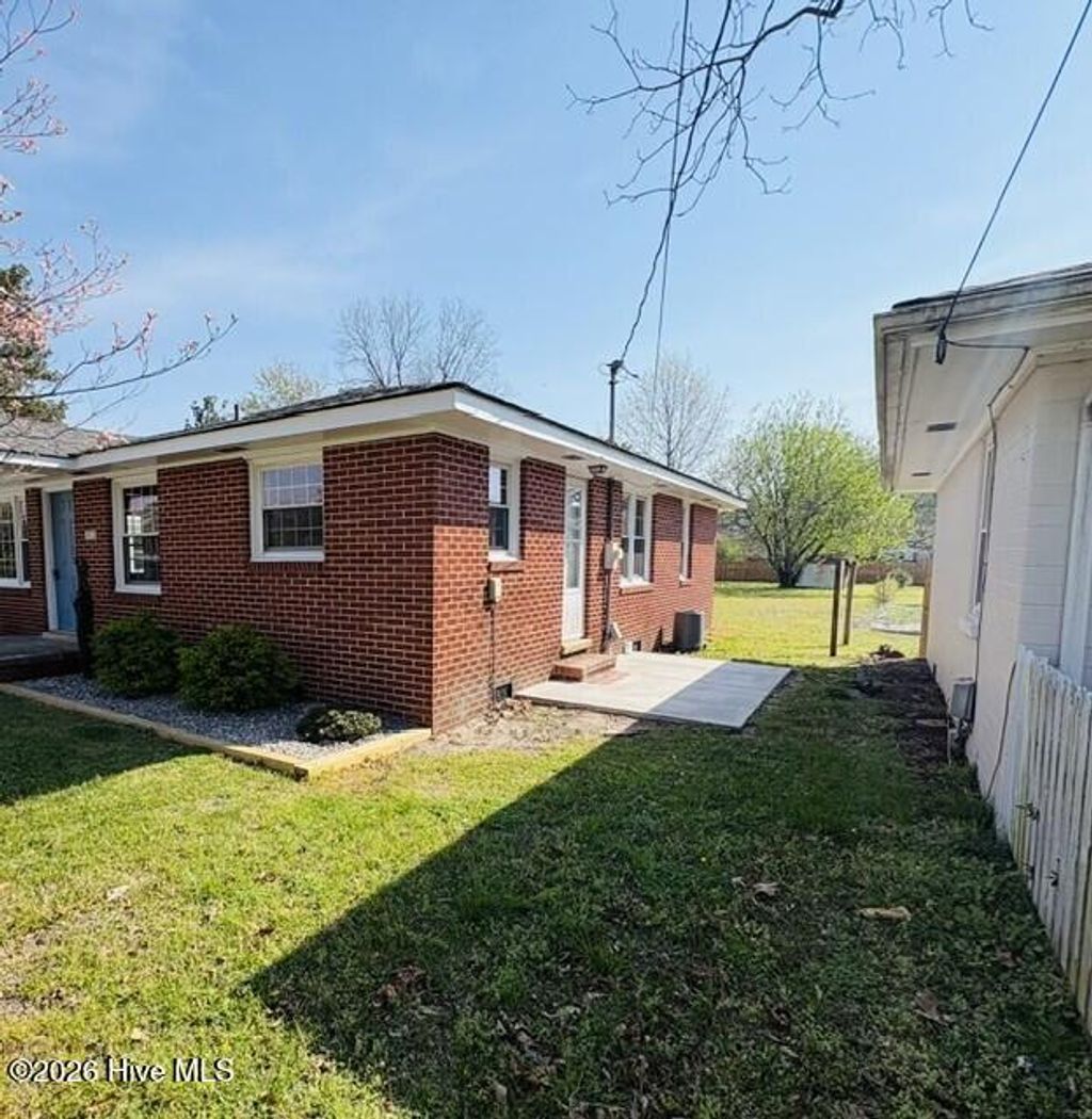 Photo of 302 NE Railroad Street, Pikeville, NC 27863 (MLS # 100563535)