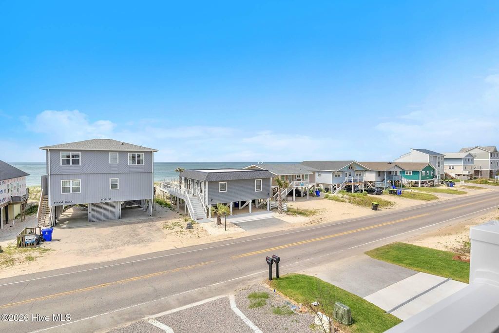 Photo of 510 W Beach Drive, Oak Island, NC 28465 (MLS # 100558345)