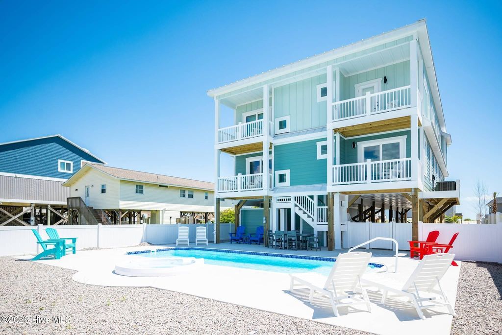 Photo of 510 W Beach Drive, Oak Island, NC 28465 (MLS # 100558345)