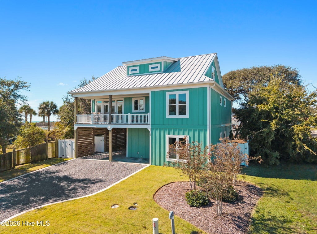 Photo of 101 SE 49th Street, Oak Island, NC 28465 (MLS # 100612480)