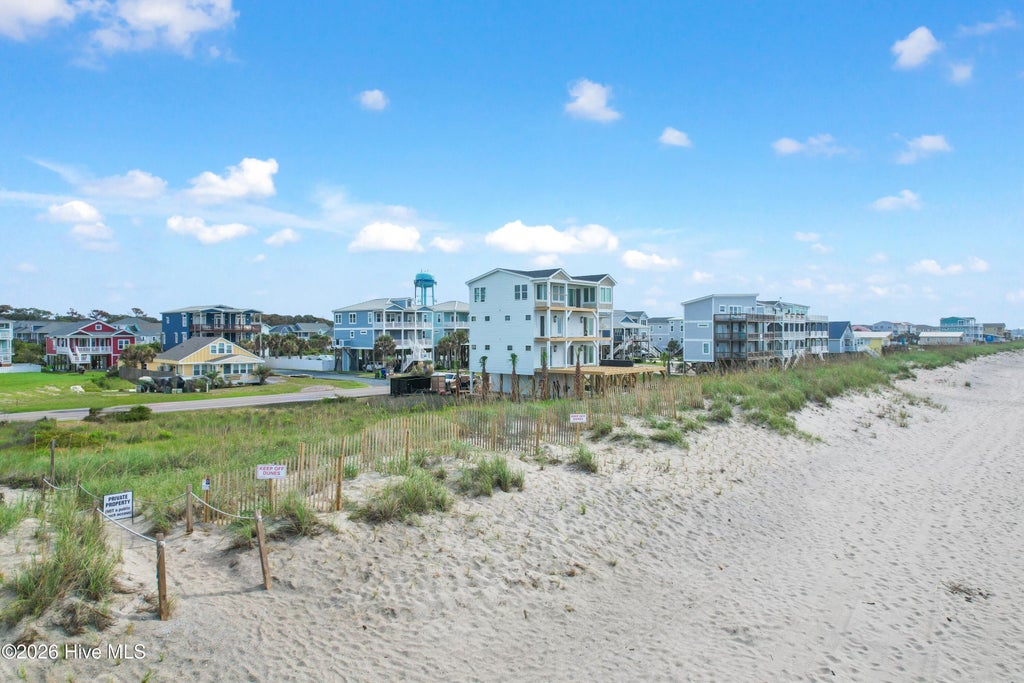 Photo of 5211 E Beach Drive, Oak Island, NC 28465 (MLS # 100600002)