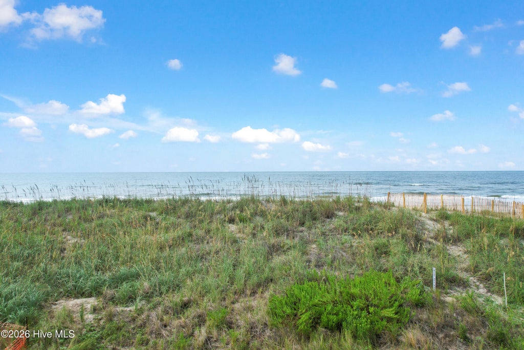 Photo of 5211 E Beach Drive, Oak Island, NC 28465 (MLS # 100600002)