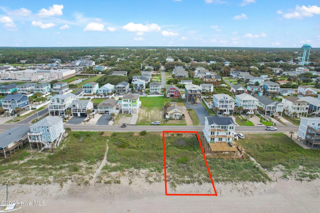 Photo of 5211 E Beach Drive, Oak Island, NC 28465 (MLS # 100600002)