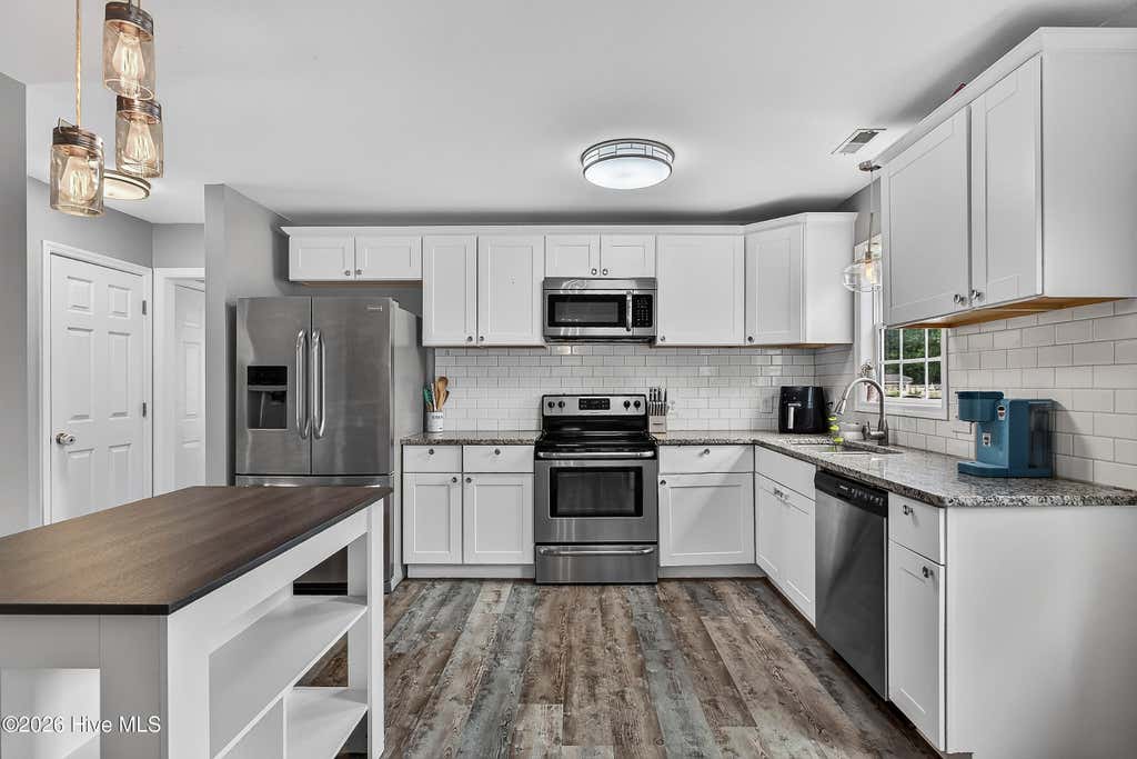 Photo of 411 Eucalyptus Lane, Jacksonville, NC 28546 (MLS # 100582962)