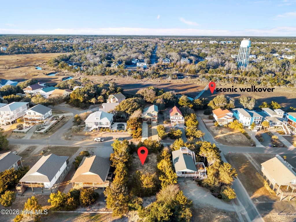 Photo of 2621 E Pelican Drive, Oak Island, NC 28465 (MLS # 100555092)