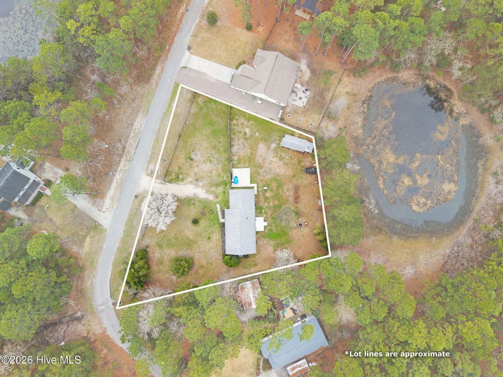 Photo of 410 Harper Lake Drive, Southport, NC 28461 (MLS # 100559662)