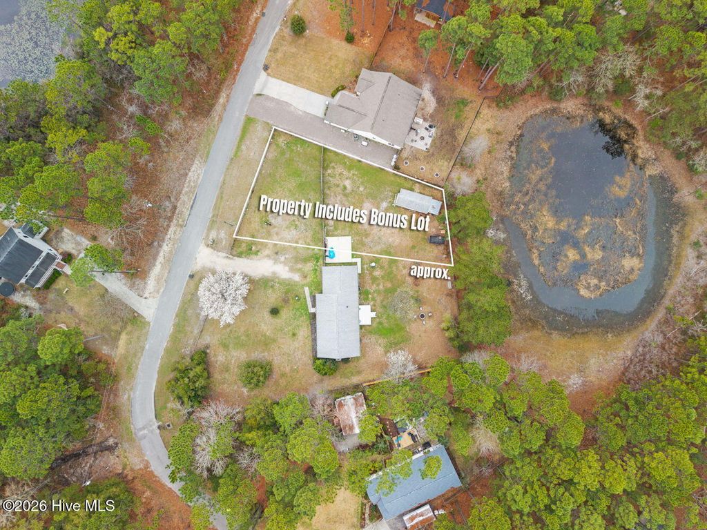 Photo of 410 Harper Lake Drive, Southport, NC 28461 (MLS # 100559662)