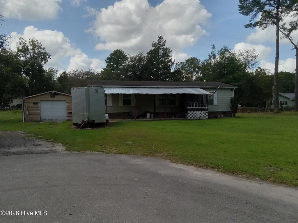 Photo of 2163 Lake Butler Lane NW, Longwood, NC 28452 (MLS # 100590351)