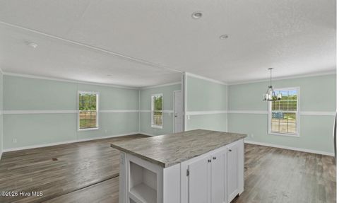 Tiny photo for 6823 Lewis Drive SE, Winnabow, NC 28479 (MLS # 100550679)