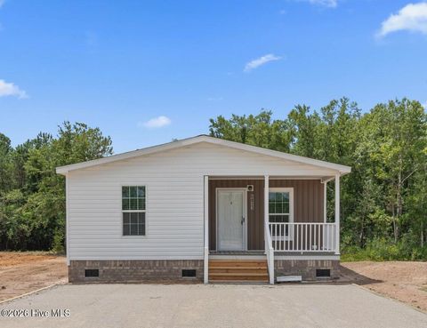 Photo of 6823 Lewis Drive SE, Winnabow, NC 28479 (MLS # 100550679)