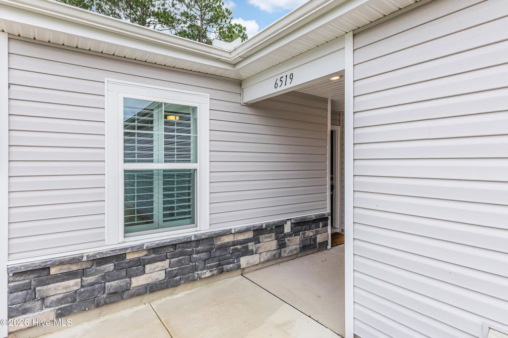 Photo of 6519 Green Fennel Avenue SW, Ocean Isle Beach, NC 28469 (MLS # 100561168)