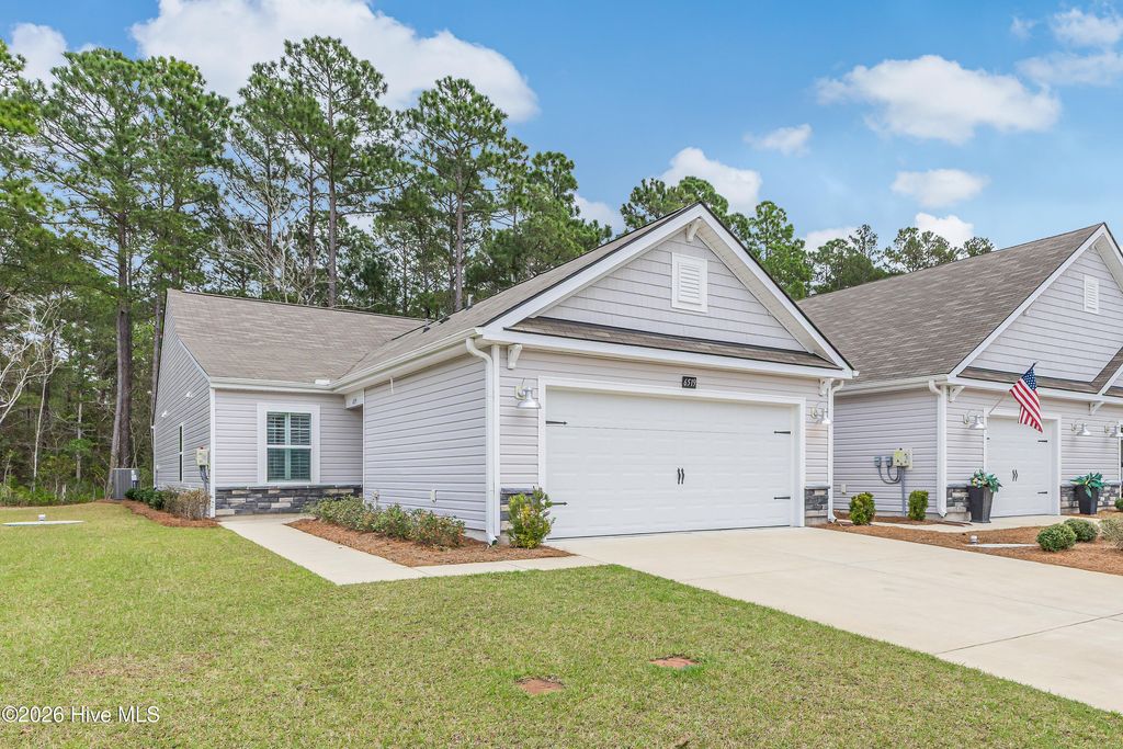 Photo of 6519 Green Fennel Avenue SW, Ocean Isle Beach, NC 28469 (MLS # 100561168)