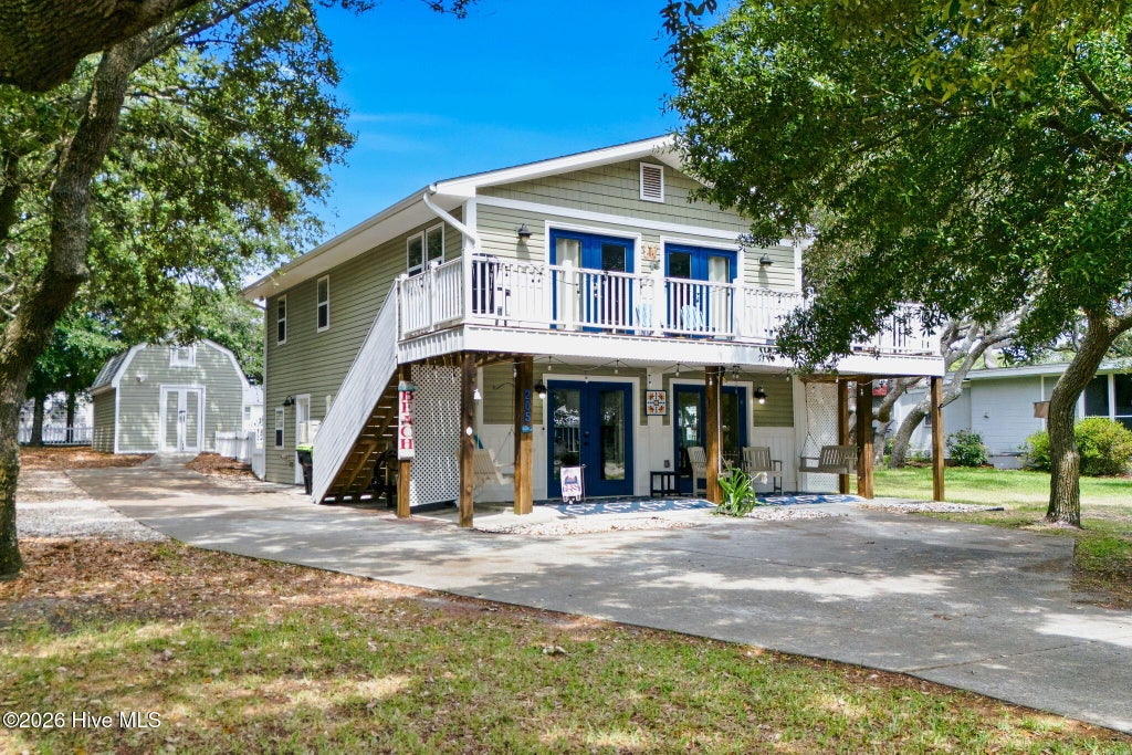Photo of 205 Mercer Street, Oak Island, NC 28465 (MLS # 100580902)