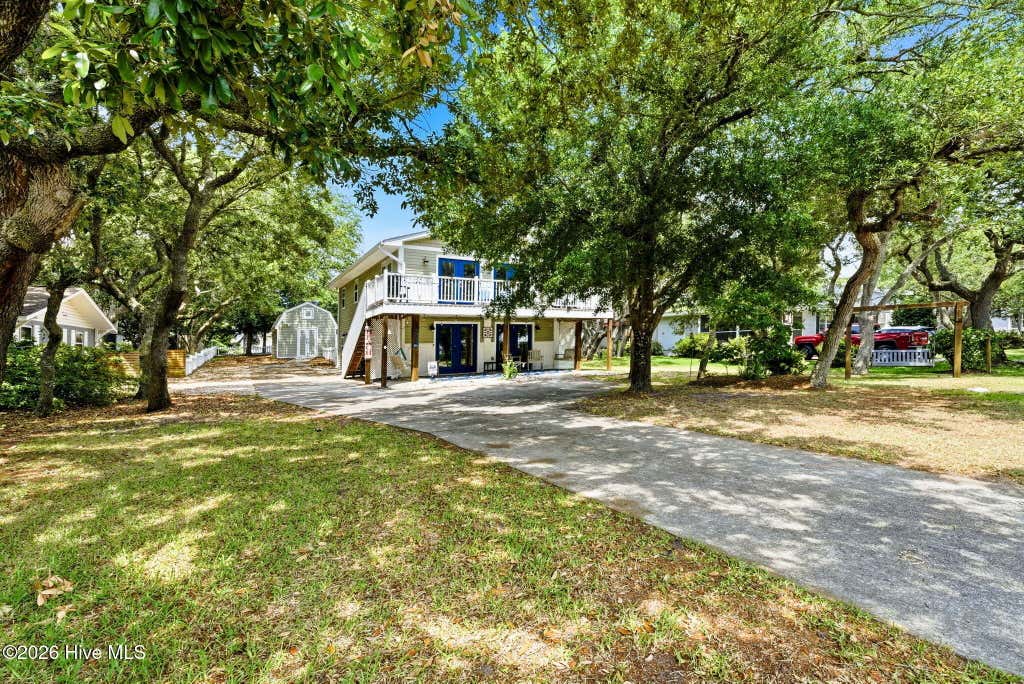 Photo of 205 Mercer Street, Oak Island, NC 28465 (MLS # 100580902)