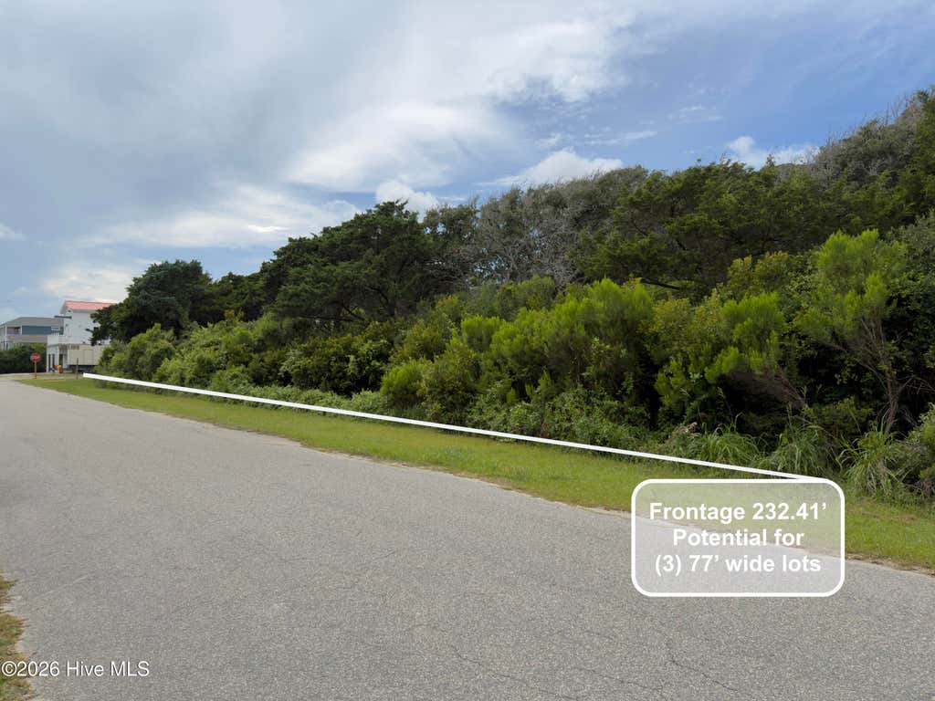 Photo of 911 W Pelican Drive, Oak Island, NC 28465 (MLS # 100589079)