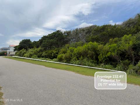 Photo of 911 W Pelican Drive, Oak Island, NC 28465 (MLS # 100589079)