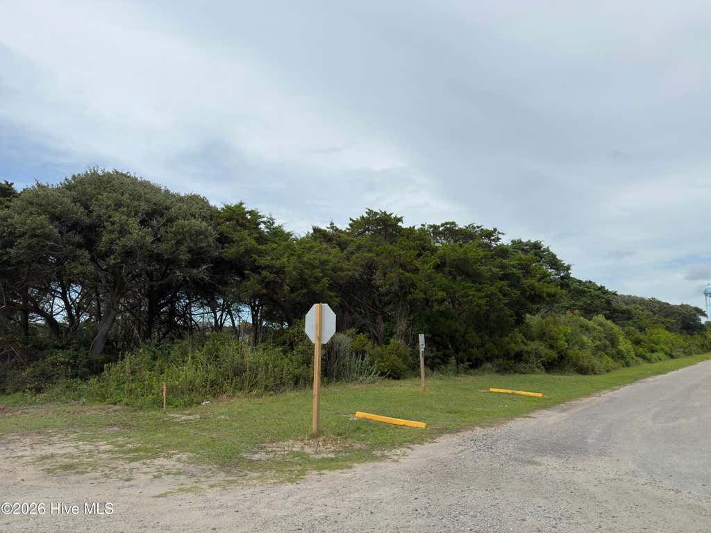 Photo of 911 W Pelican Drive, Oak Island, NC 28465 (MLS # 100589079)
