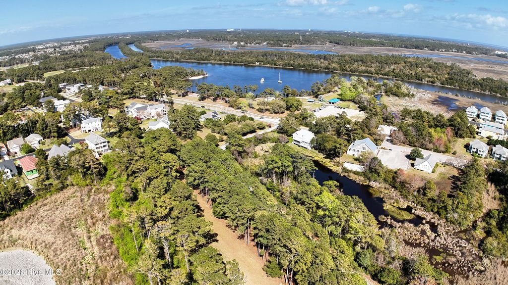 Photo of 3 Barnes Bluff Drive SE, Oak Island, NC 28461 (MLS # 100563541)
