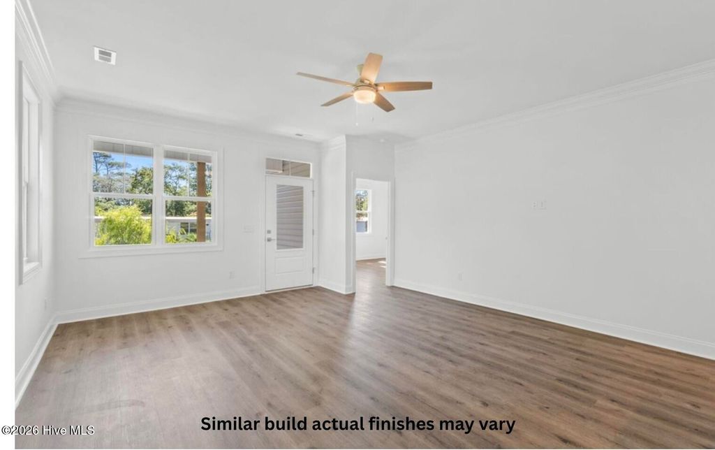 Photo of 130 NE 75th Street, Oak Island, NC 28465 (MLS # 100570970)