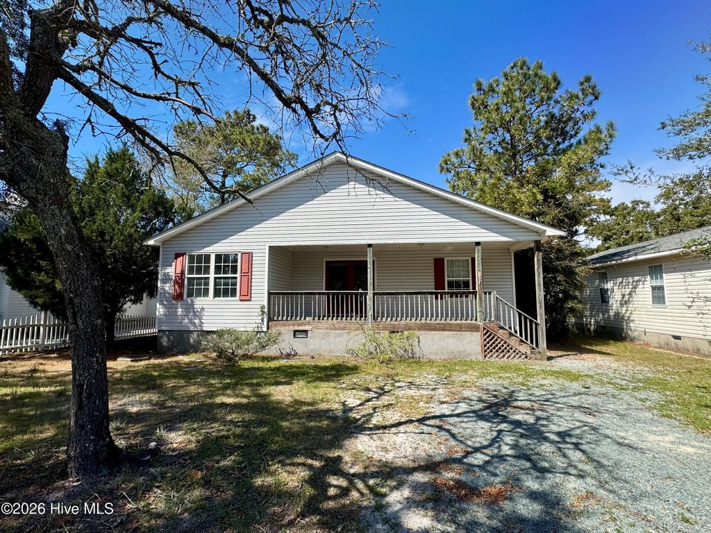 Photo of 137 NE 31st Street, Oak Island, NC 28465 (MLS # 100561066)