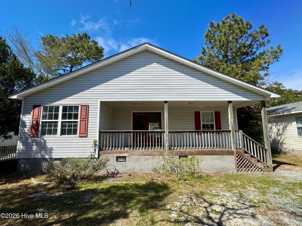 Photo of 137 NE 31st Street, Oak Island, NC 28465 (MLS # 100561066)