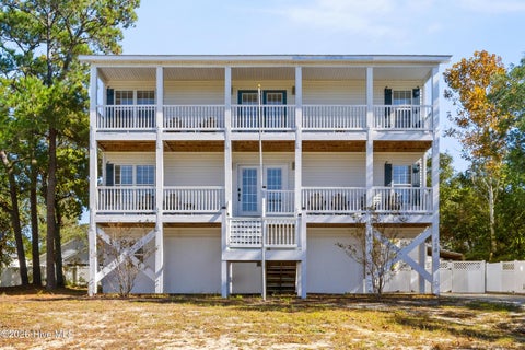 Photo of 128 NW 10th Street, Oak Island, NC 28465 (MLS # 100613132)