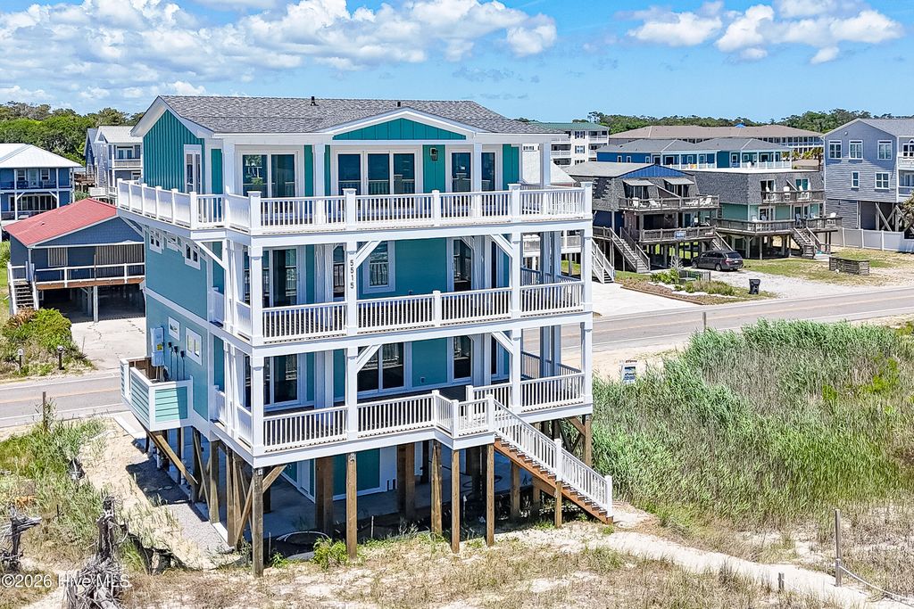 Photo of 5515 E Beach Drive, Oak Island, NC 28465 (MLS # 100575634)