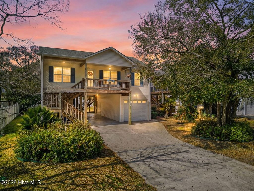 Photo of 103 SE 34th Street, Oak Island, NC 28465 (MLS # 100558532)